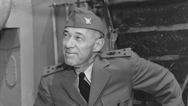 A 1943 photograph showing the commandant, Vice Adm. Russell Waesche, during a tour of wartime Coast Guard forces in the field. U.S. Coast Guard photo.