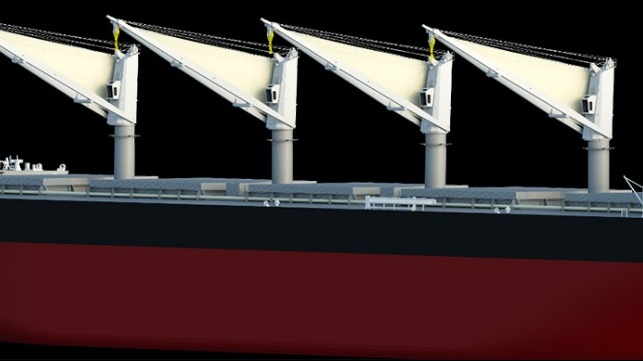 sails incorporated into cargo ship cranes 