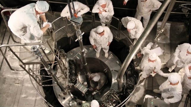 Technicians loading the first reactor aboard the Akademik Lomonosov, Russia's floating nuclear power plant. Credit: Rosenergoatom