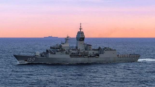 Australian warship at sunset