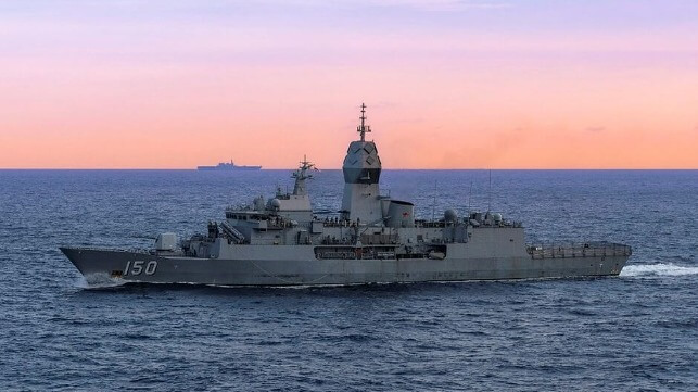 Australian warship at sunset