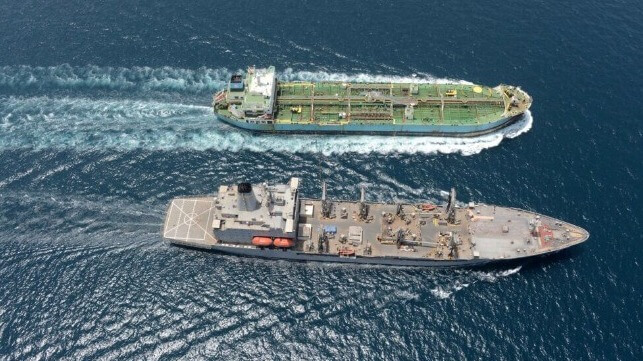 USNS John Lenthall fleet oiler with a civilian tanker