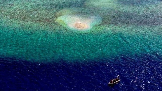 This small pile of crushed coral is out of place on Sabina Reef, and is a suspected sign of reclamation (PCG)