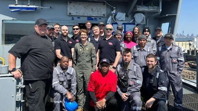 Gen. Van Ovost (center left) with the crew of USNS Watkins (USTRANSCOM)