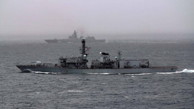 HMS Portland (foreground) tracks the Russian frigate Admiral Kasatonov (Royal Navy)