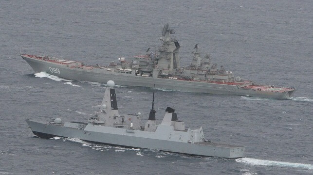 Russian Navy battlecruiser Pyotr Velikiy with the destroyer HMS Dragon