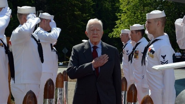 Former President Jimmy Carter is piped aboard the nuclear-powered submarine USS Jimmy Carter, 2015 (USN / Naval History and Heritage Command)