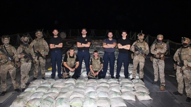 CTF-150 Carries Out Two Mideast Drug Busts in One Day Marines and sailors aboard HMS Lancaster show the haul of hashish they seized from a dhow (Royal Navy)