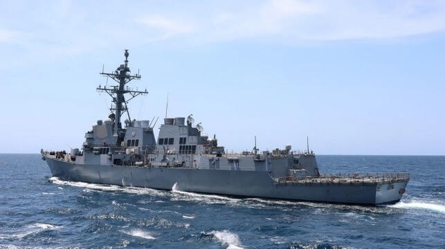 US warship downs drone