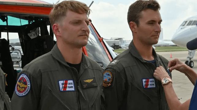 Rescue swimmer PO2 Scott Ruskan and flight mechanic PO3 Seth Reeves receive medals for their service during the response (USCG)