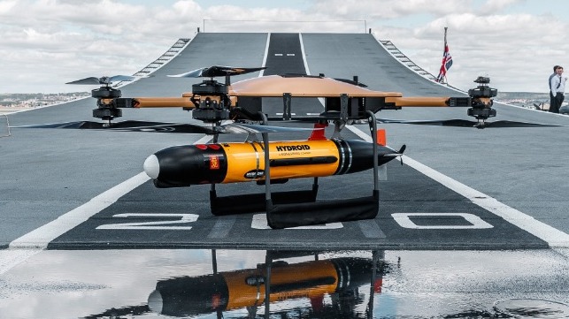 A UAV carrying an AUV on the deck of the carrier HMS Prince of Wales (Royal Navy)