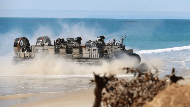 A U.S. Navy LCAC comes ashore with a Marine Corps unit aboard, Talisman Sabre 2025 (US Army)