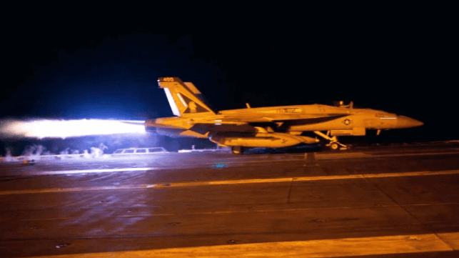 An F/A-18 fighter launches from the deck of USS Dwight D. Eisenhower en route to a Houthi target, Feb. 2024 (USN)