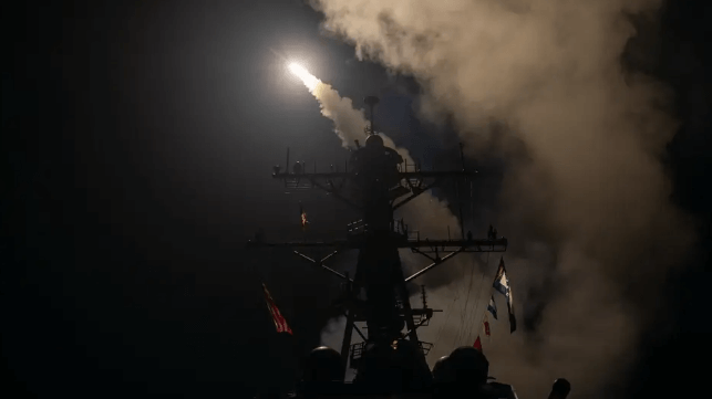 The destroyer USS Gravely launches a Tomahawk missile in a counterstrike against Houthi targets in Yemen, Jan. 11 (USN)