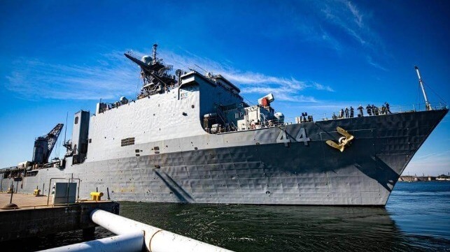 USS Gunston Hall at a pier