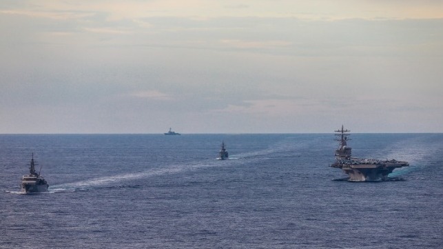 USS Ronald Reagan under way with two Japan Maritime Self Defense Force training ships, South China Sea, July 7 (USN)