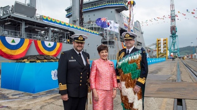 Captain Simon Rooke, Commanding Officer (Designate) of Aotearoa, Dame Patsy Reddy Governor General of New Zealand and the Chief of Navy, Rear Admiral David Proctor, in front of Aotearoa.