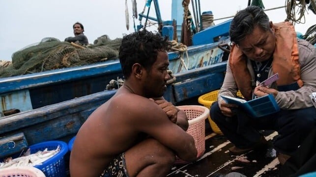 Cambodian fisherman aboard a Thai fishing vessel undergoing an inspection.