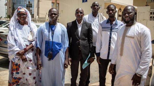 Litigants outside a court in Senegal