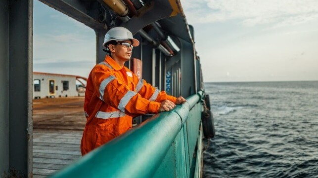 Seafarer on deck of anchor handling ship 