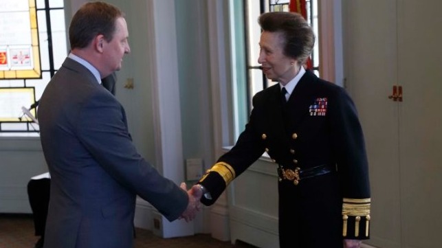 Mark Dickinson receiving the Merchant Navy Medal