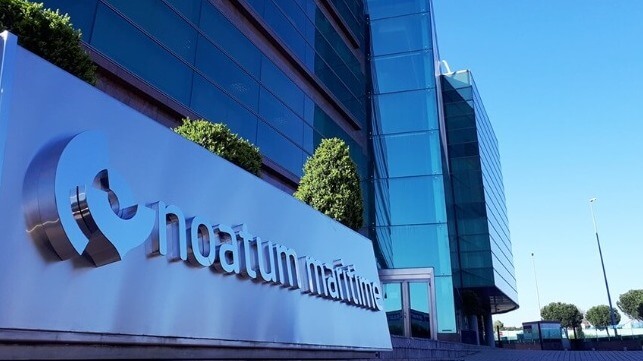 Glass-fronted office building bearing logo of Noatum Maritime