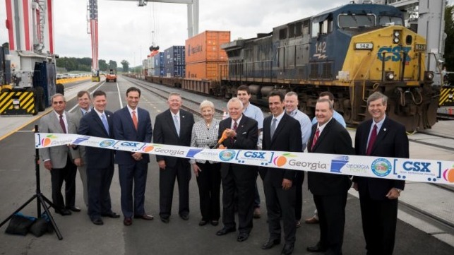 Gov. Nathan Deal, center, cuts a ribbon during the Grand Opening of the Appalachian Regional Port.