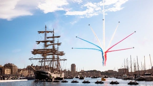 Belem arrives in Marseille, with French aerobatic team in background