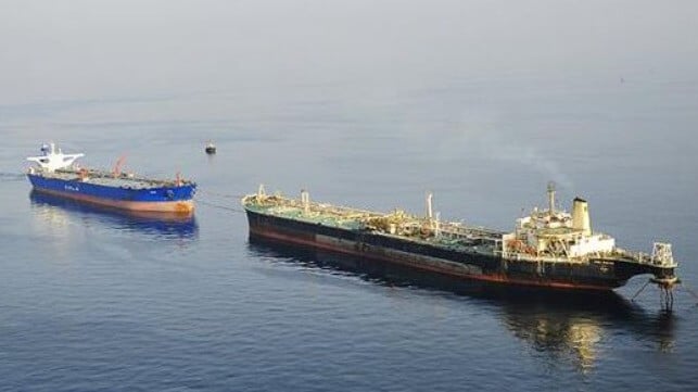 An Iranian FSU offloads oil to a waiting tanker (NITC)