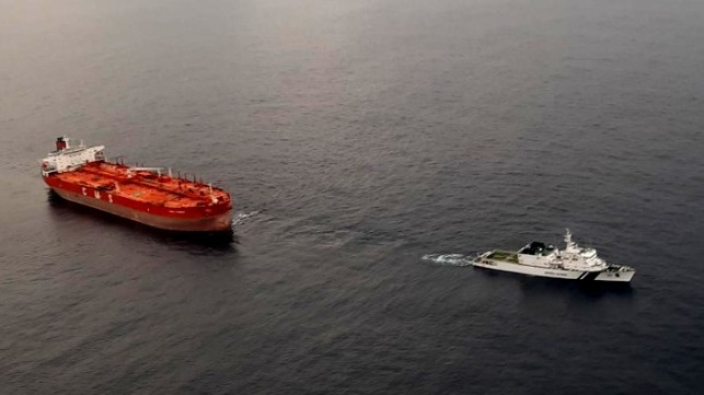 blacked out oil tanker towed by Indian Coast Guard 
