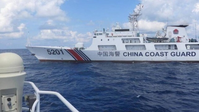 China Coast Guard 5201 cuts off a Philippine Coast Guard cutter