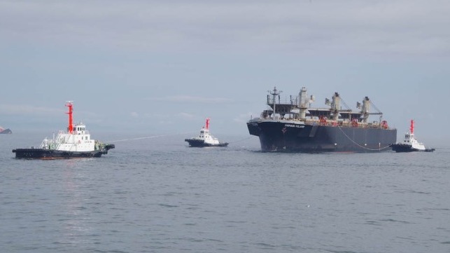 bow section of wrecked bulker docked to offload 