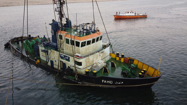 Photos: Suez Canal Recovers Tug After Collision