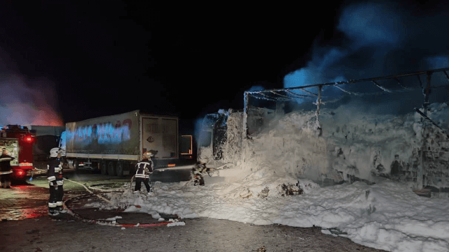 Ukrainian firefighters use foam to extinguish a burning truck at Izmail, Sept. 25 (Odesa Regional State Administration)q
