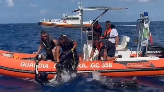 Italian divers come aboard a RIB