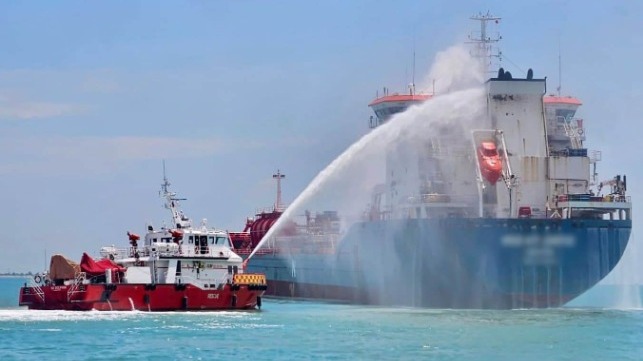 A firefighting boat applies water to the stack of the product tanker Med Atlantic, Singapore, October 2024 (Singapore Civil Defence Force)