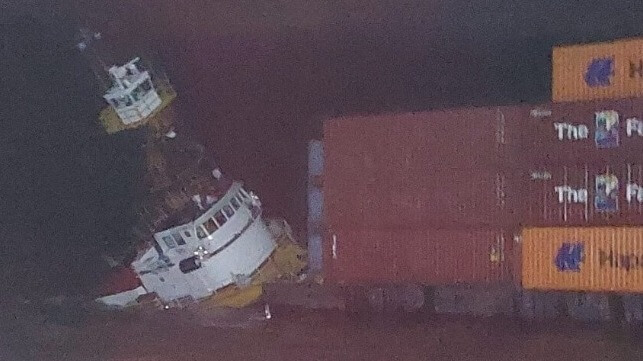 Papu Mar sinking by the stern while still attached to her container barge (Argentine Naval Prefecture)