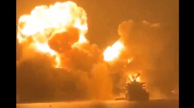 An unknown product tanker (lower right) at Ras Isa during the U.S. strike, April 18 (Houthi social media)