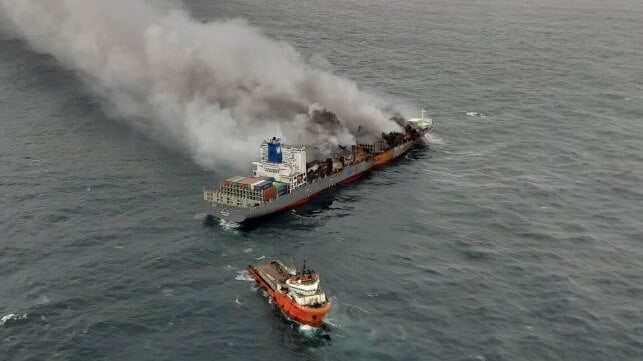 tow of burning containership