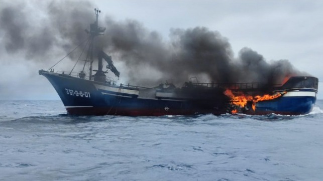 burning fishing vessel