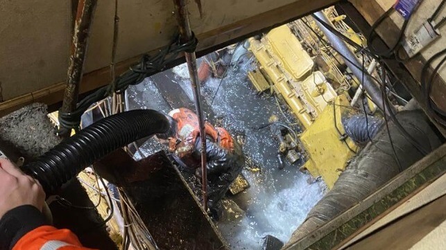 Dewatering in action in the engine room of the sinking shrimp boat Captain Alex
