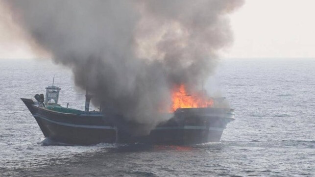burning smuggling dhow in the gulf of oman