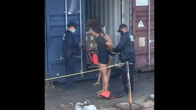 San juan stowaways on barge with CBP officers