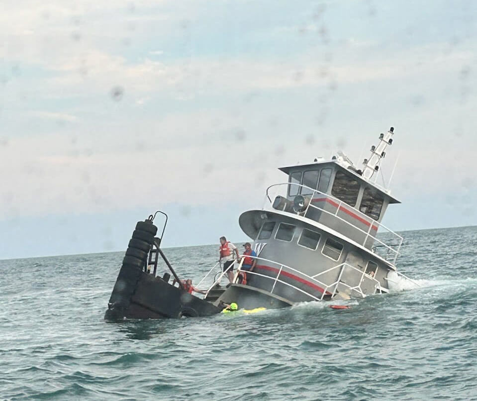 Three Crewmembers Saved from Sinking Tugboat off South Carolina Three Crewmembers Saved from Sinking Tugboat off South Carolina